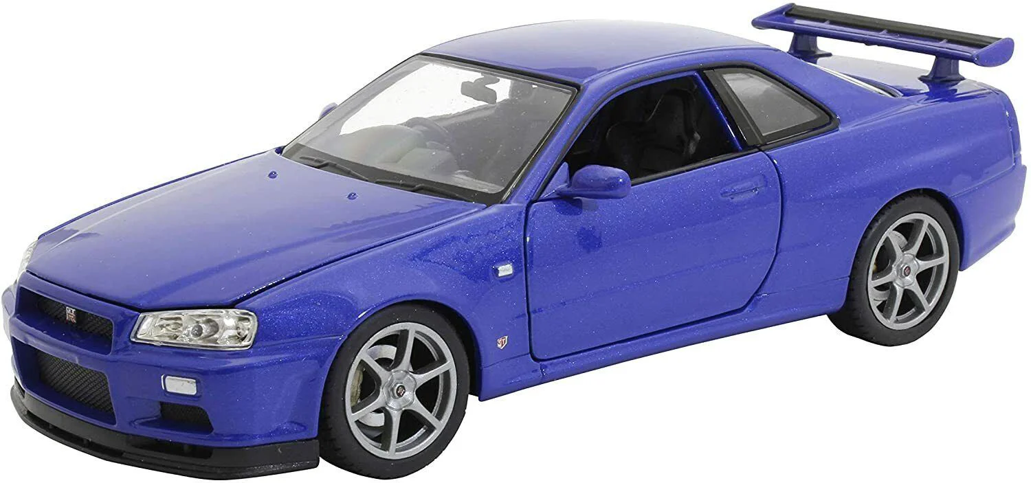image for Машин металлическая Welly Nissan Skyline GT-R, 1:24 foto