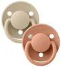 Набор из 2 круглых силиконовых пустышек BIBS De Lux Vanilla/Peach (0-36 мес.) foto