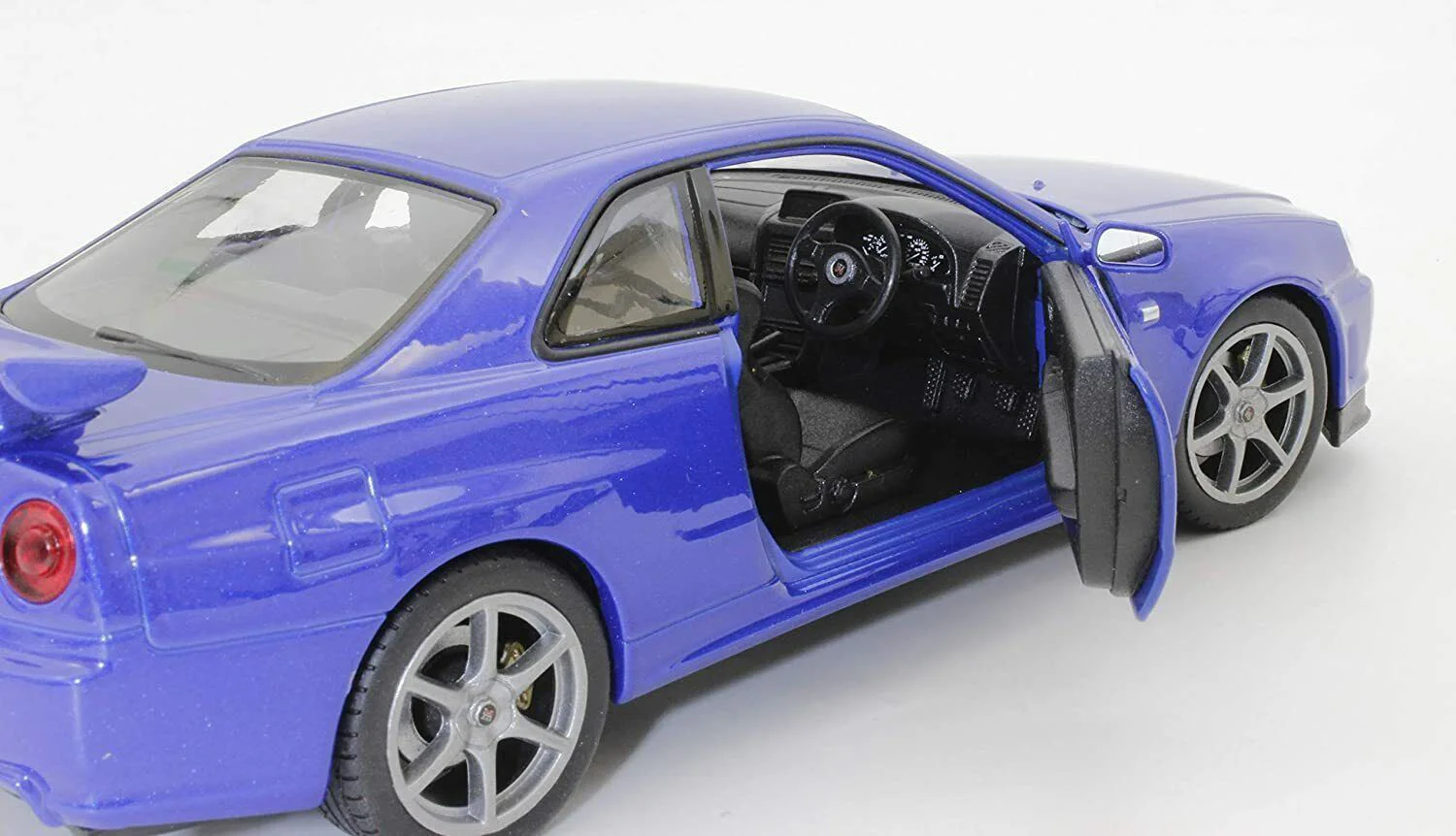 Masina din metal Welly Nissan Skyline GT-R, 1:24 foto