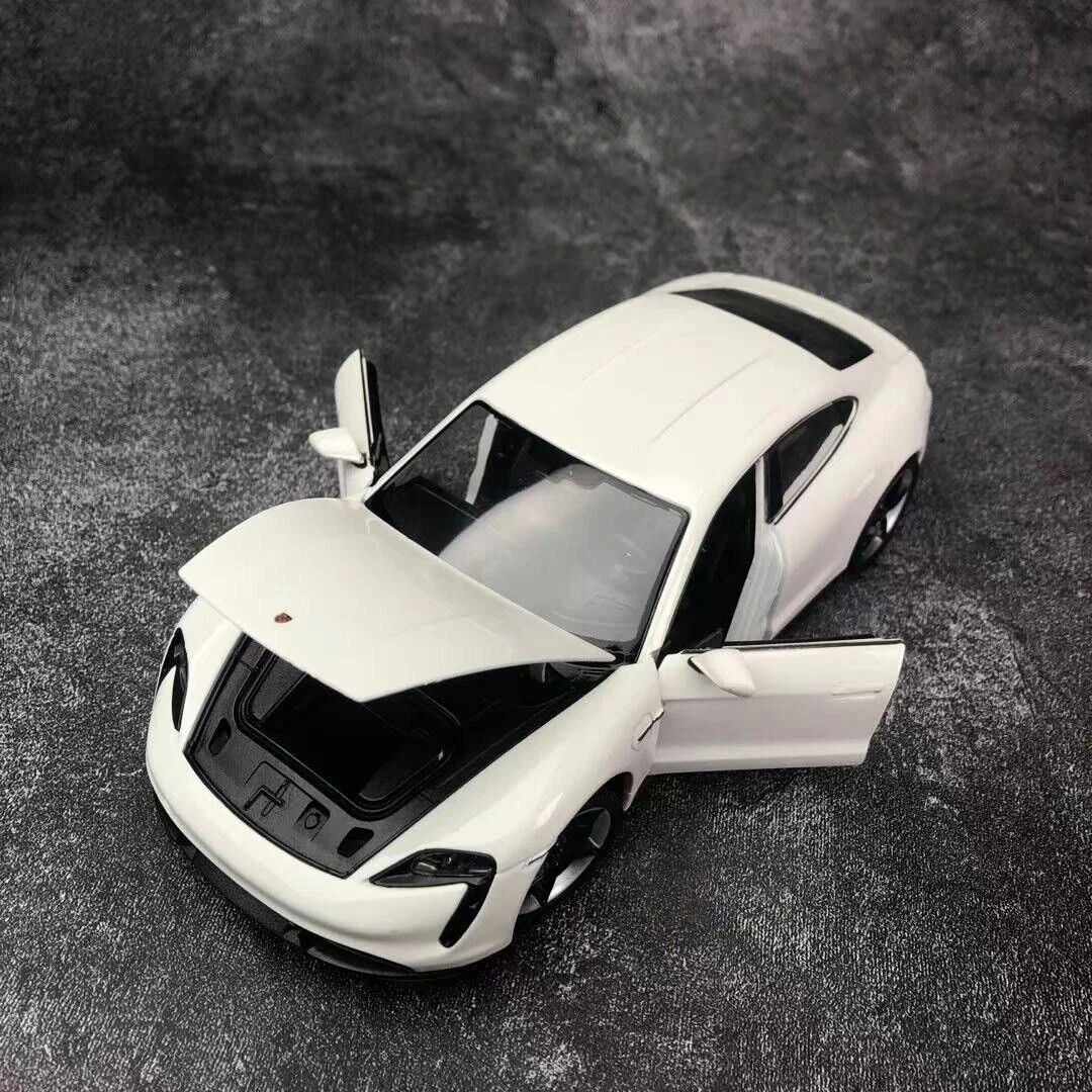 Машинa металлическaя Welly Porsche Taycan Turbo, 1:24