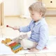 Set de joaca din lemn Fisher-Price cu 5 instrumente muzicale