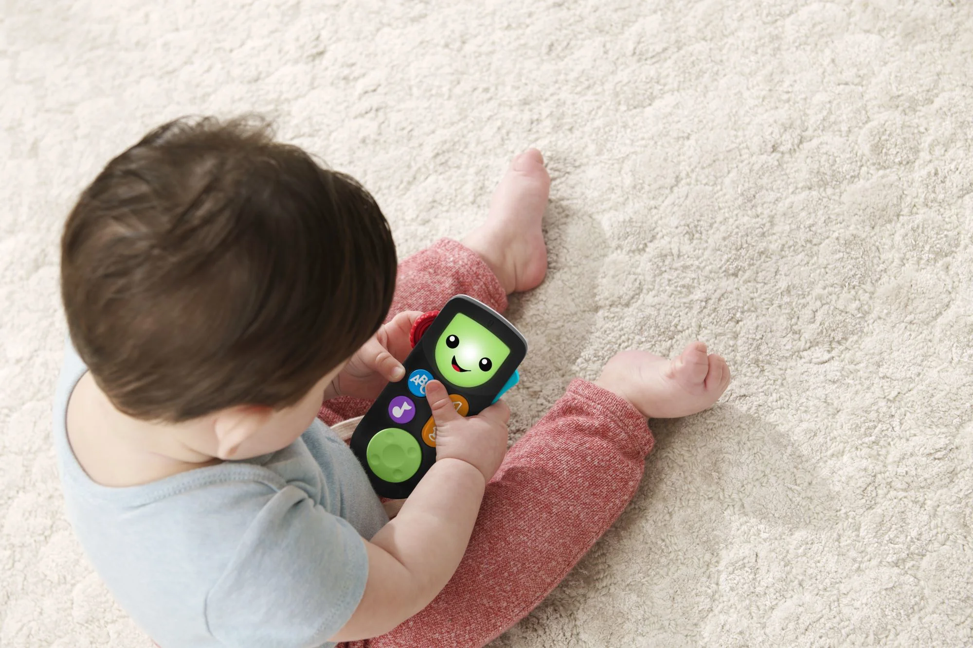 Jucarie interactiva Fisher-Price Telecomanda Razi si invata