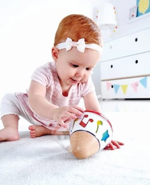 Деревянная игрушка Hape Вращающаяся музыкальная пирамида foto