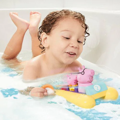 Игрушка для ванны Tomy Свинка Пеппа на велосипеде foto