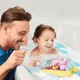 Игрушка для ванны Tomy Свинка Пеппа на велосипеде foto