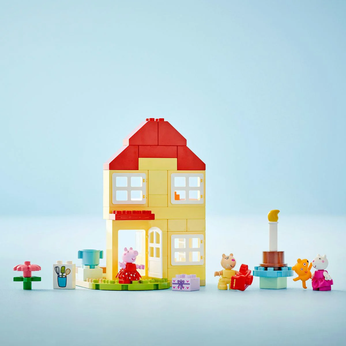 Set de constructie LEGO Duplo Purcelusa Peppa si casa aniversara, 59 el.