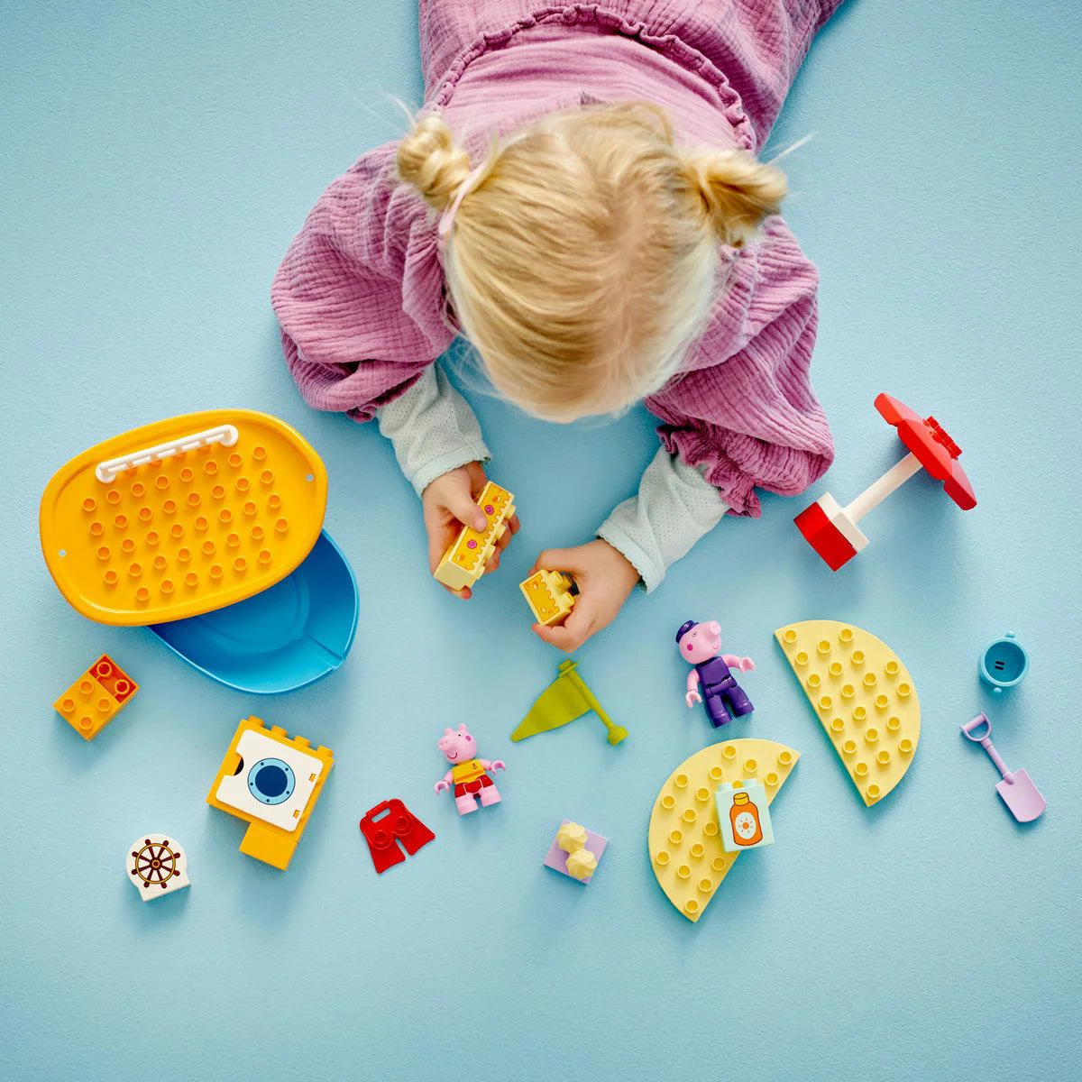 Set de constructie LEGO Duplo Excursia cu barca a Purcelusei Peppa, 23 el. foto