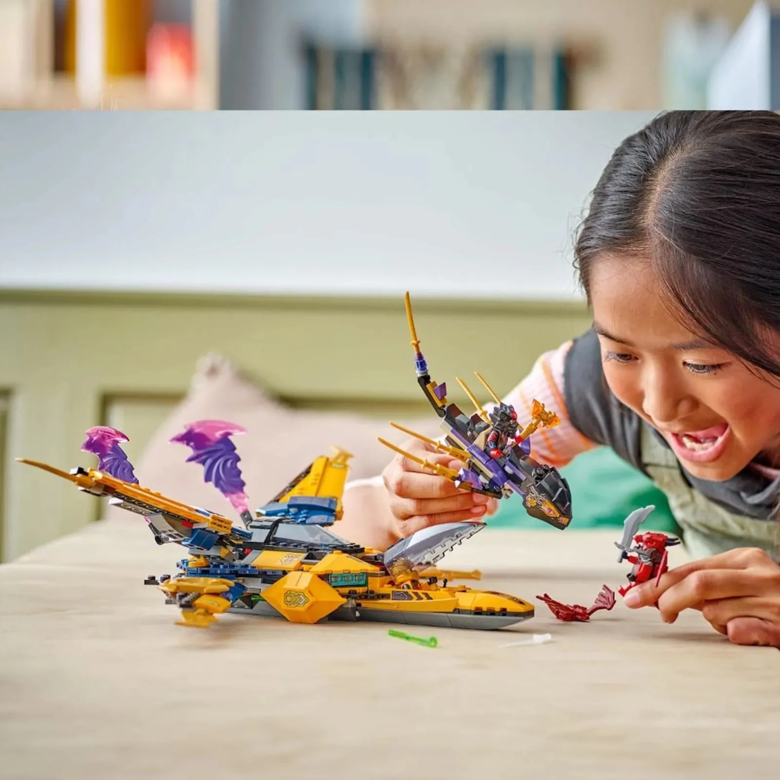 Set de constructie LEGO Ninjago Superavionul cu reactie al lui Ras si Arin, 510 el. foto