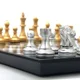Joc de masa Board Games Sah magnetic cu piese aurii si argintii foto