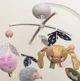 Музыкальная игрушка Taf Toys для кроватки, серия Городской сад foto