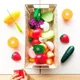Set de joaca Battat Cos de legume cu fructe pe lipici foto