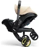 Scoica auto 2 in 1 Doona i-Size Sahara Sand foto
