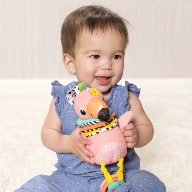 Игрушка мягкая музыкальная Infantino Фламинго foto