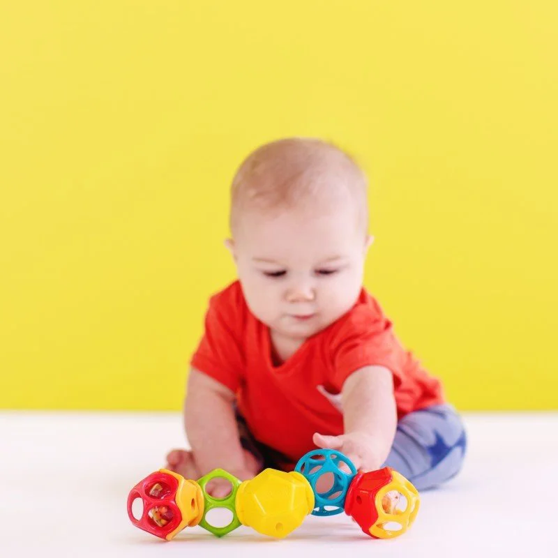 Jucarie Oball Easy-Grasp Clicky Twister™ foto