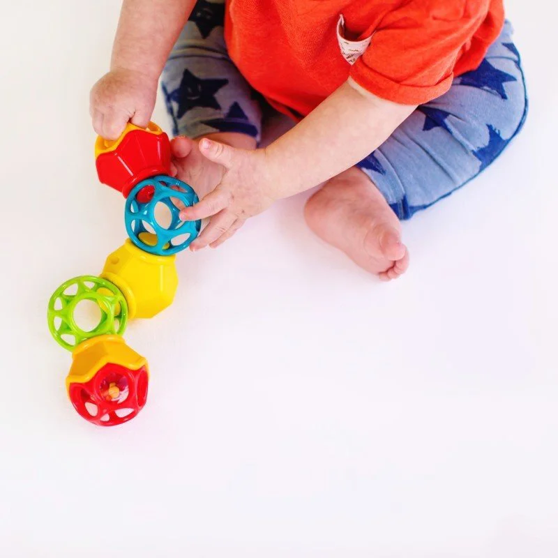 Jucarie Oball Easy-Grasp Clicky Twister™ foto