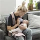 Marsupiu anatomic BabyBjorn Mini Dusty Pink cu pozitii multiple de purtare, bumbac