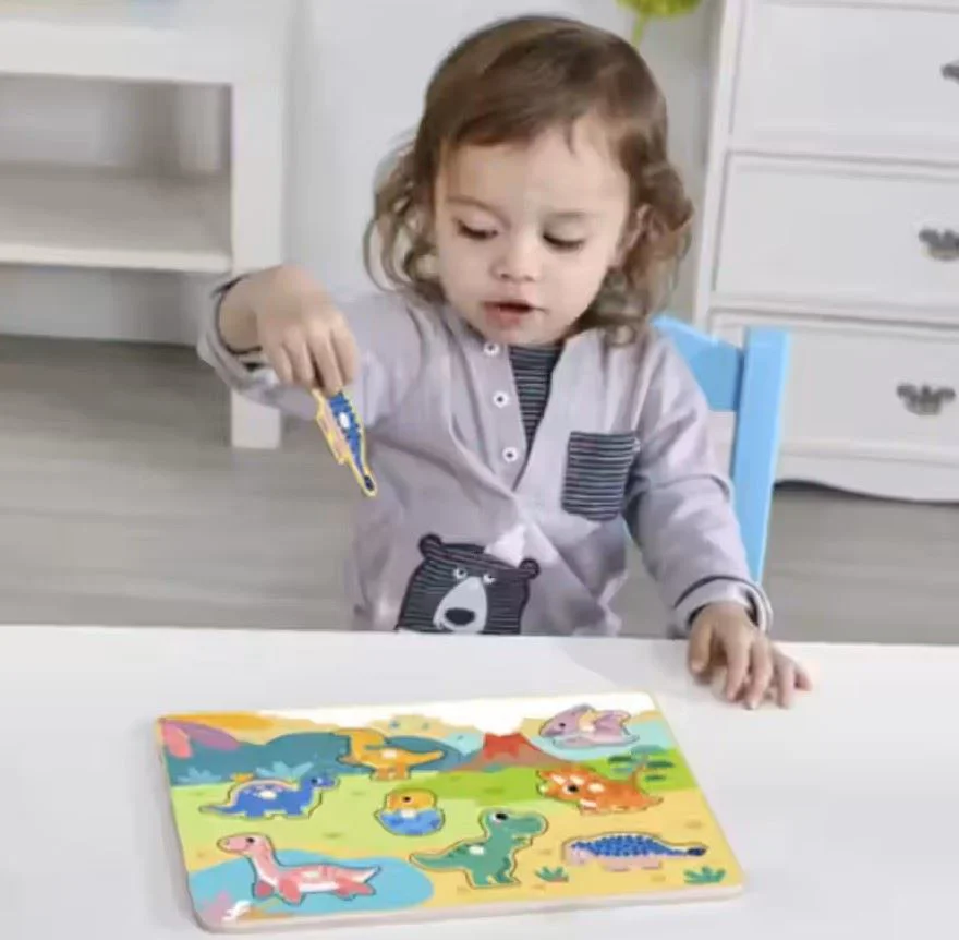 Деревянный развивающий пазл Tooky Toy Динозавры foto