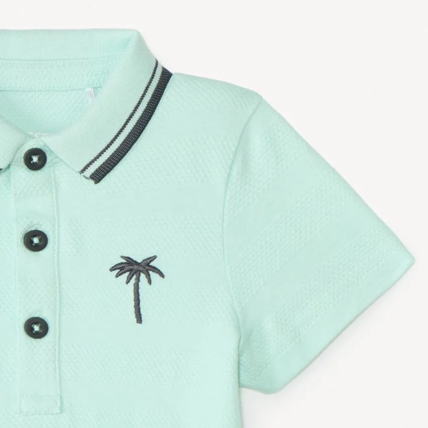 Orchestra Tricou polo cu palmier foto