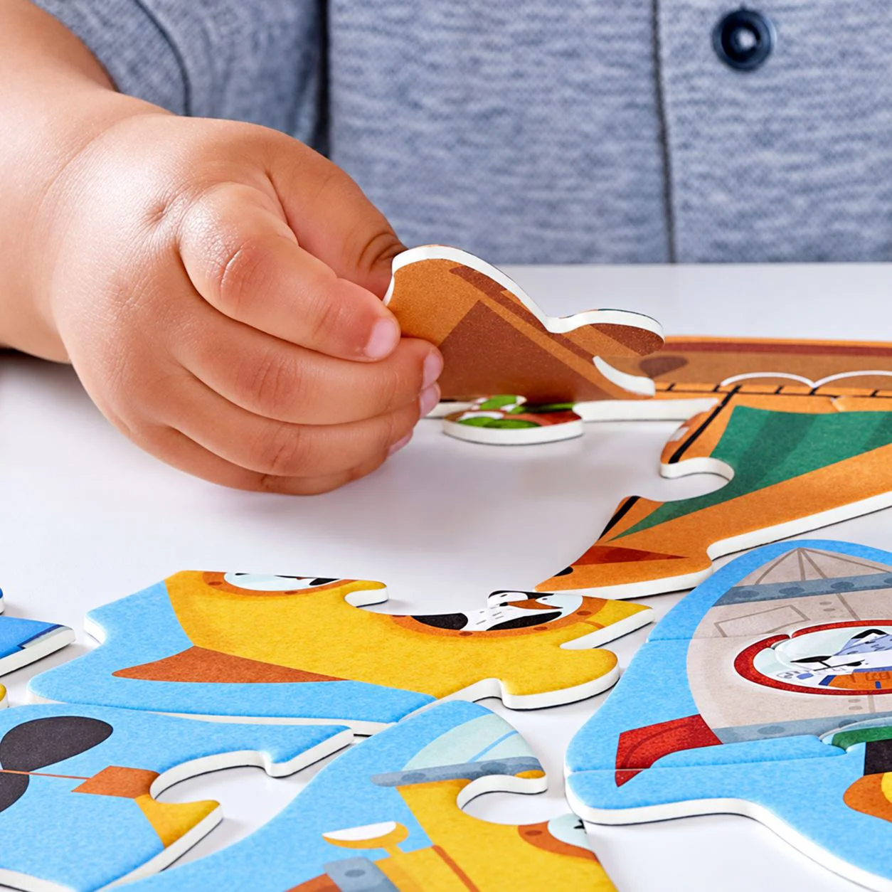 Puzzle din lemn 15 in 1 Hape Vehicule foto