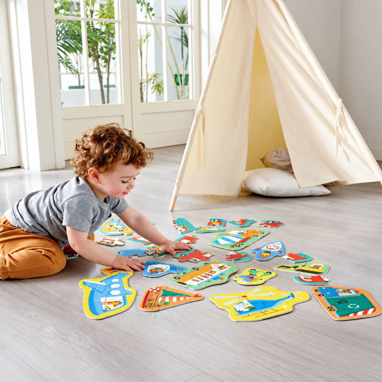 Puzzle din lemn 15 in 1 Hape Vehicule foto