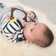 Развивающая игрушка-подвеска Taf Toys Принц Пингвинчик - коллекции Полярное Сияние