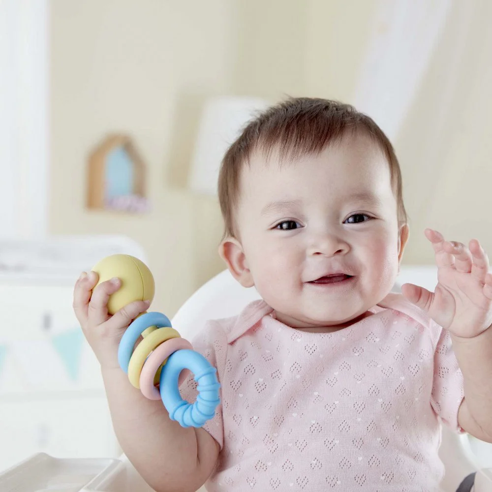 Прорезыватель для зубов Hape Rattling Rings Teether foto