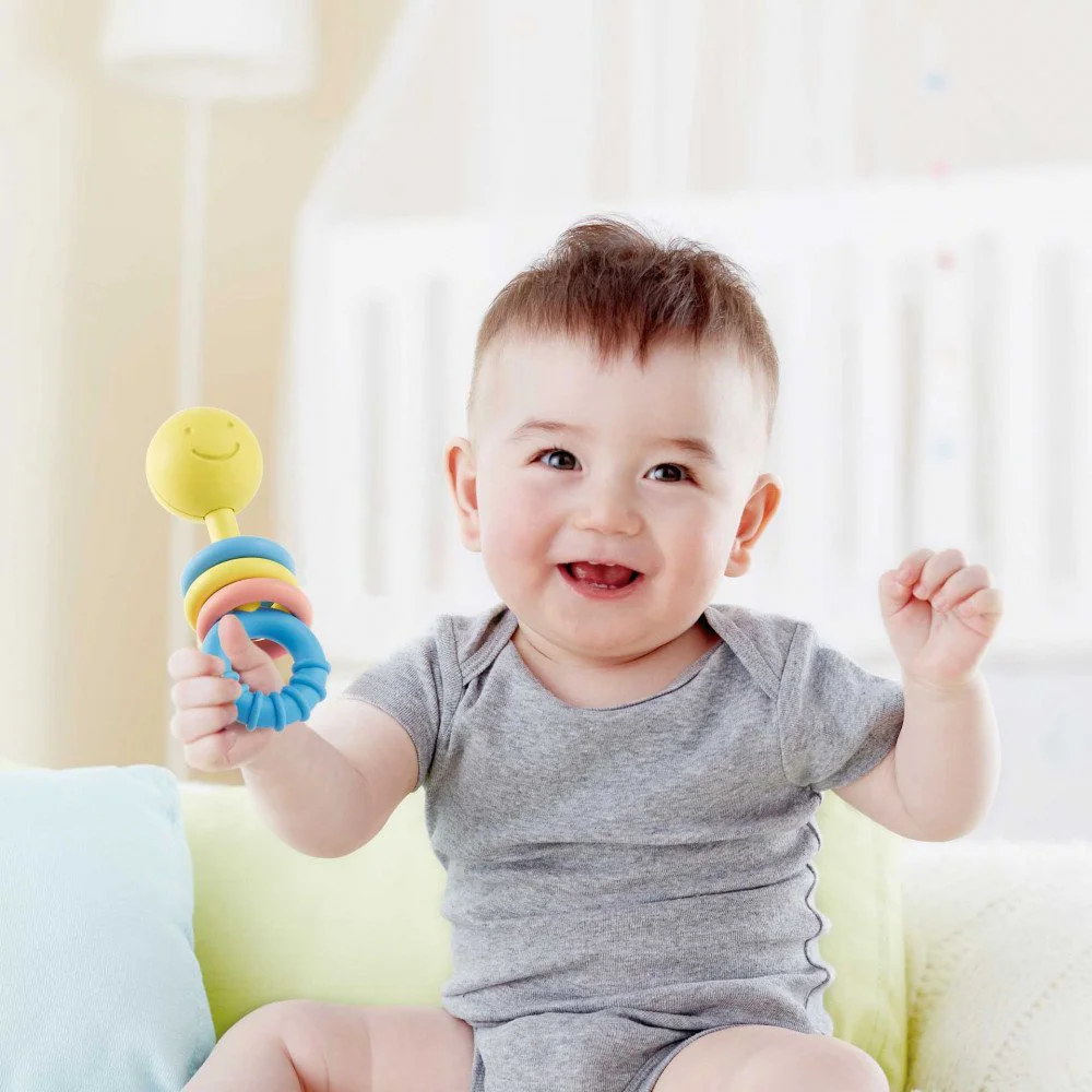 Прорезыватель для зубов Hape Rattling Rings Teether foto