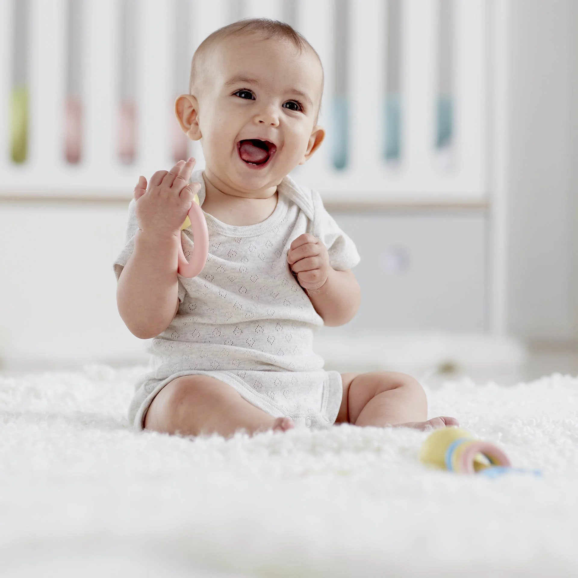 Игрушка прорезыватель Hape Ring Rattle foto
