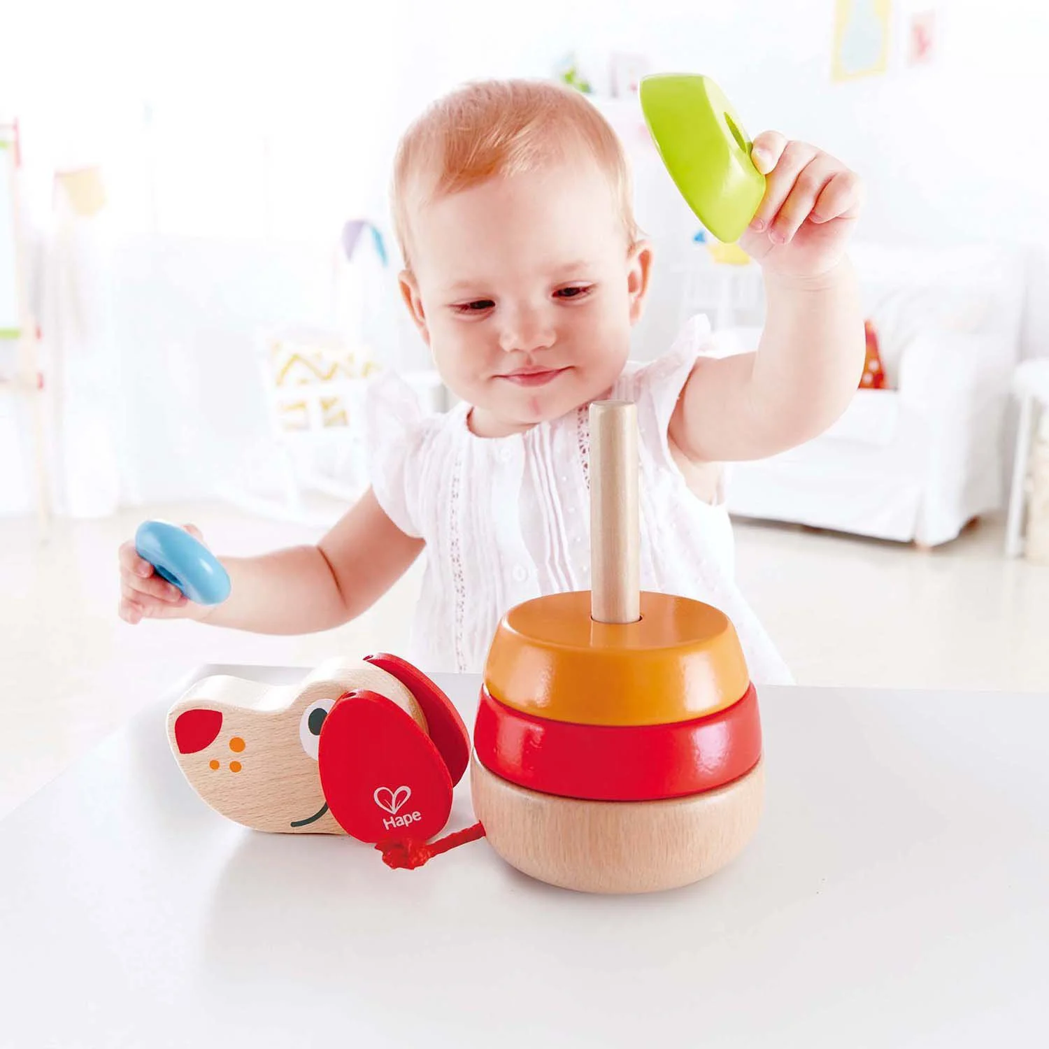Деревянная развивающая игрушка Пирамидка Щенок Hape foto