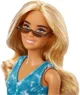 Papusa Barbie Fashionista in salopeta albastra foto