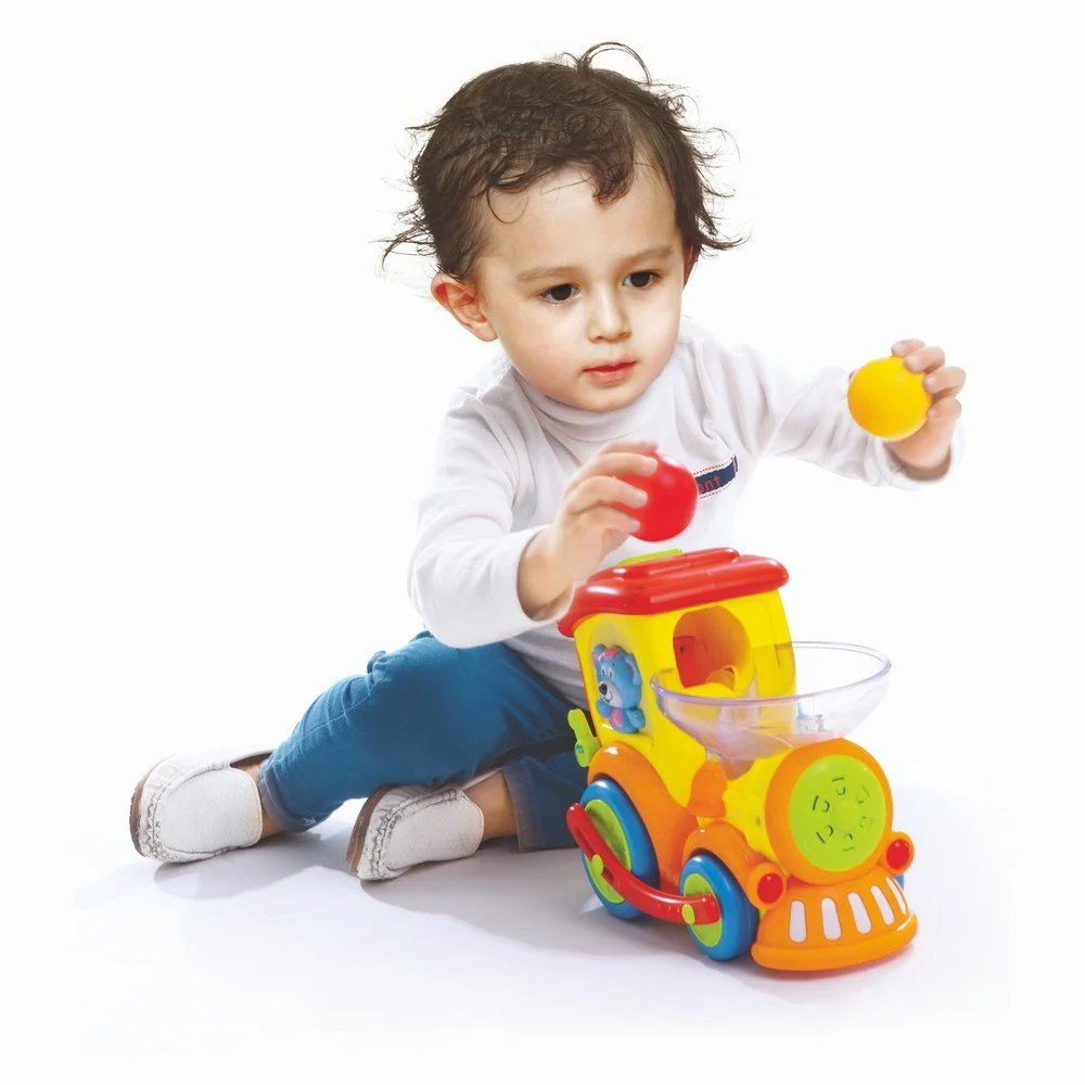 Музыкальная игрушка Hola Toys Локомотив с шариками, звуками и огнями