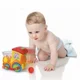 Музыкальная игрушка Hola Toys Локомотив с шариками, звуками и огнями