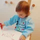 Нагрудник с рукавами для занятий BabyJem ABC Blue