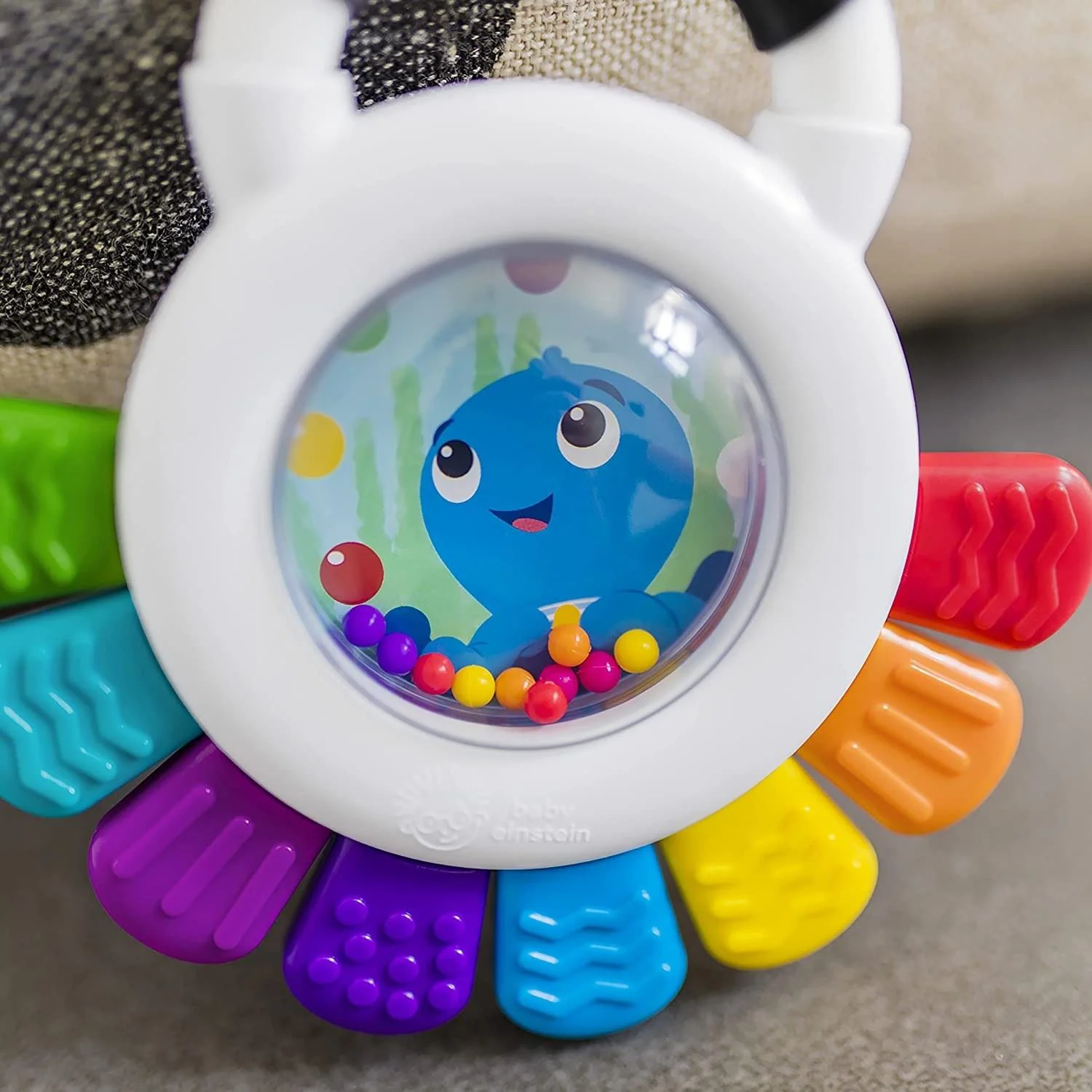 Мультисенсорная игрушка для прорезывания зубов Baby Einstein Счастливый осьминог