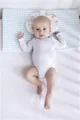 Подушка для поддержания головы ребенка Badabulle